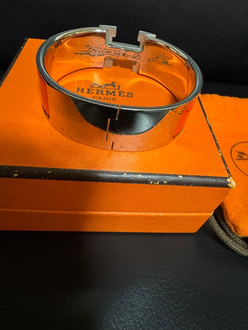 HERMÈS（エルメス）のオレンジバングル