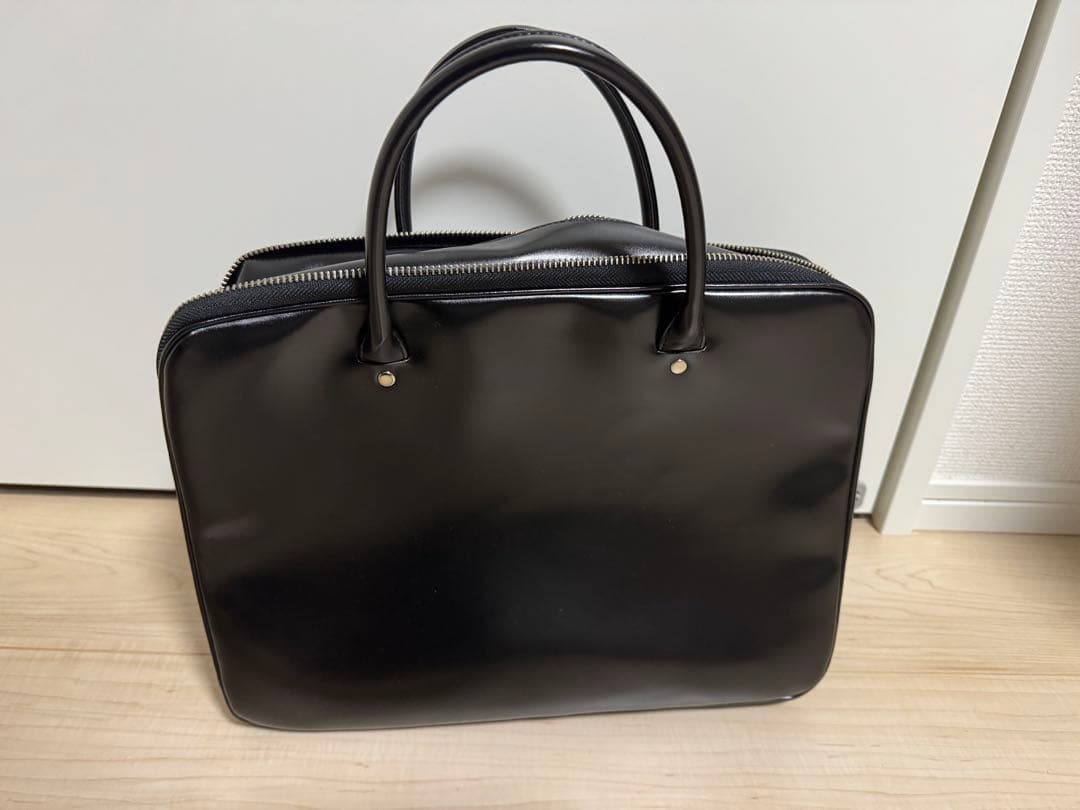 COMME des GARÇONS ブラックレザーハンドバッグ