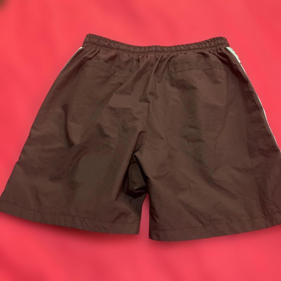 CAUTIONテープ付き黒ショートパンツ　沖縄限定