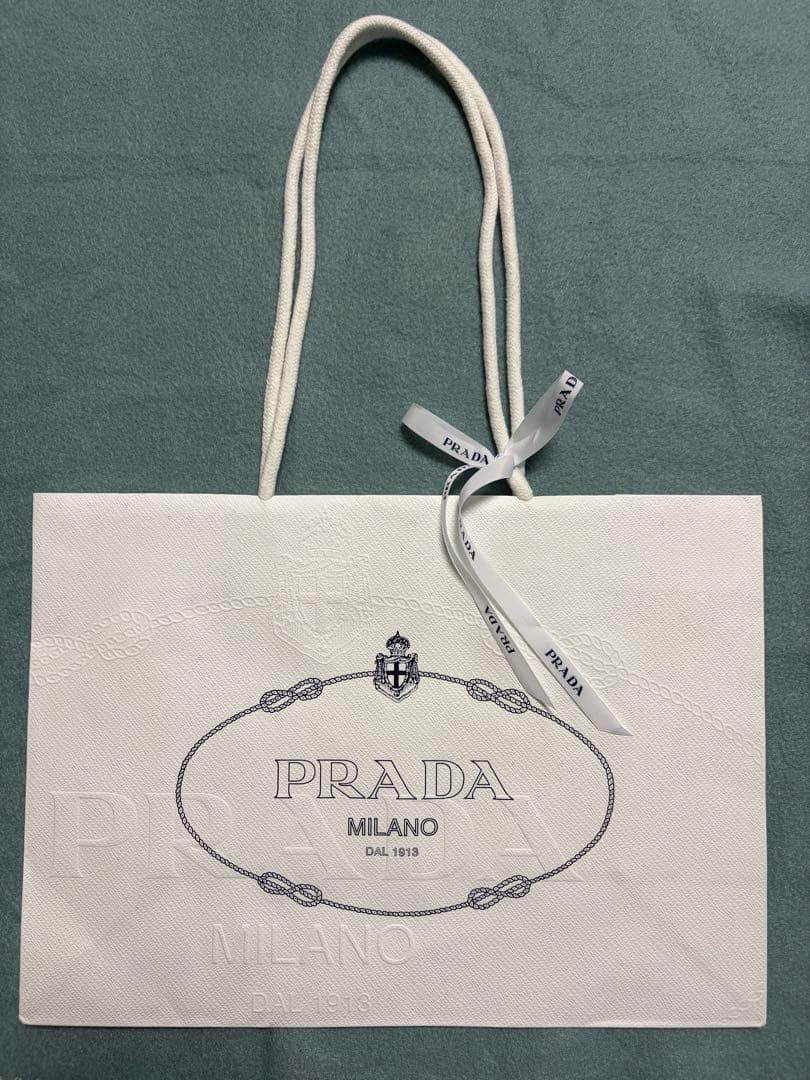 PRADA ブラウン iPhoneケース14pro 取り外し可能ストラップ付き