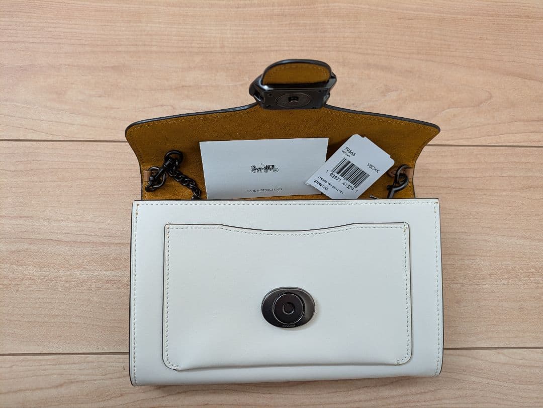 【希少・美品】COACHフラワーモチーフクラッチバッグ