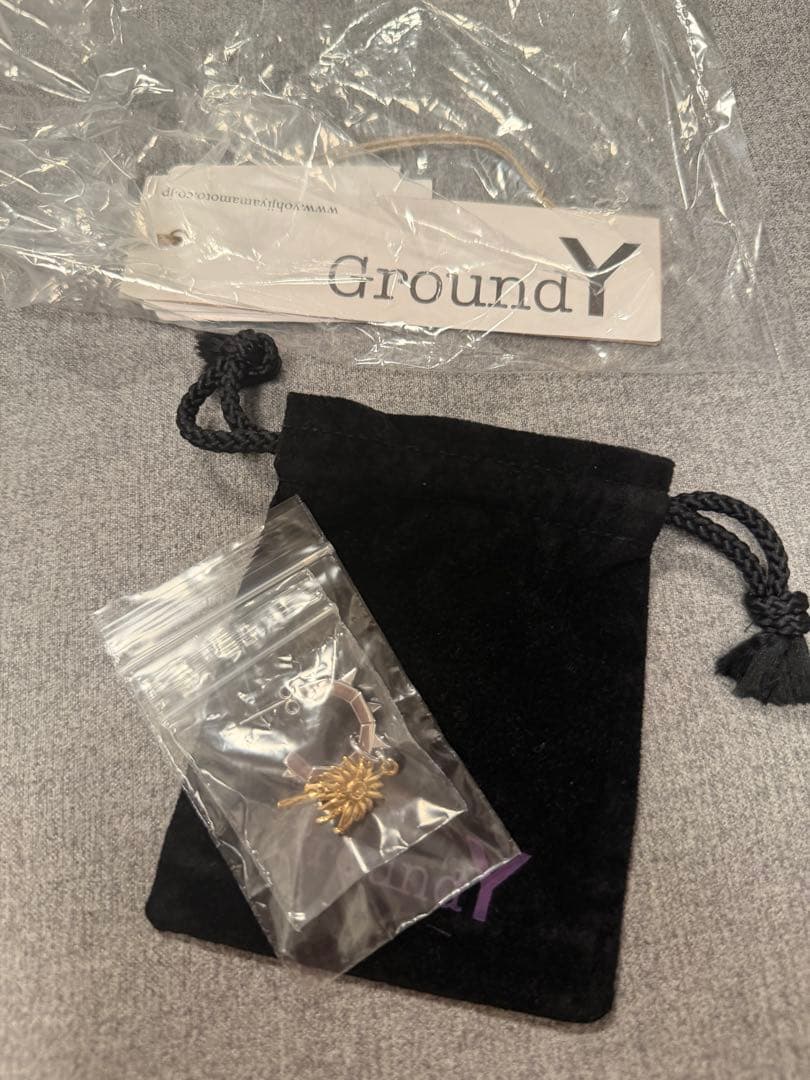 アクセサリー CHAINSAW BLADE AND FLOWER EARRING