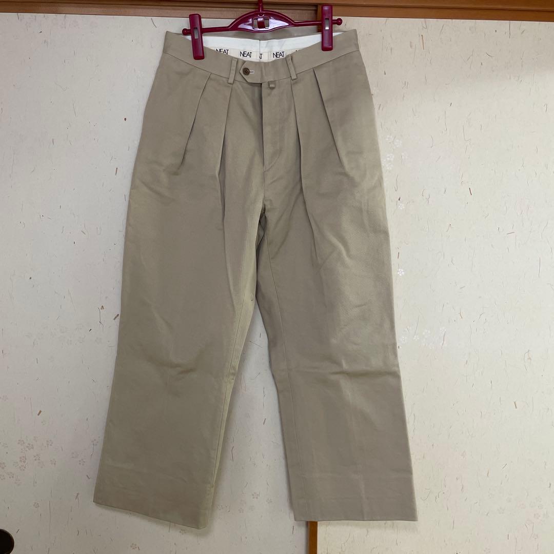 neat ベージュ スラックス