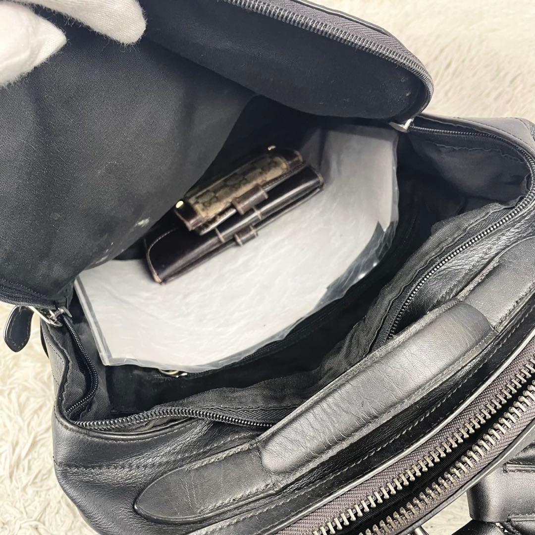 A4可 美品 コーチ PVC リュック シグネチャー ロゴ型押し ファスナー 黒