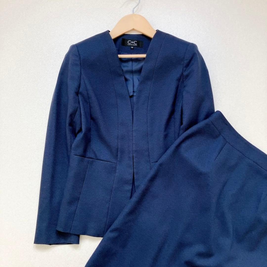 クードシャンス　スカートスーツ　ノーカラー　オフィス　ビジネス　セレモニー　紺