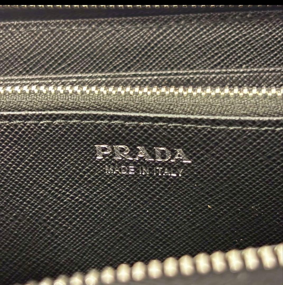 プラダ　長財布　サフィアーノ　レザー　ブラック　ラウンドジップ　ギャランティ付き