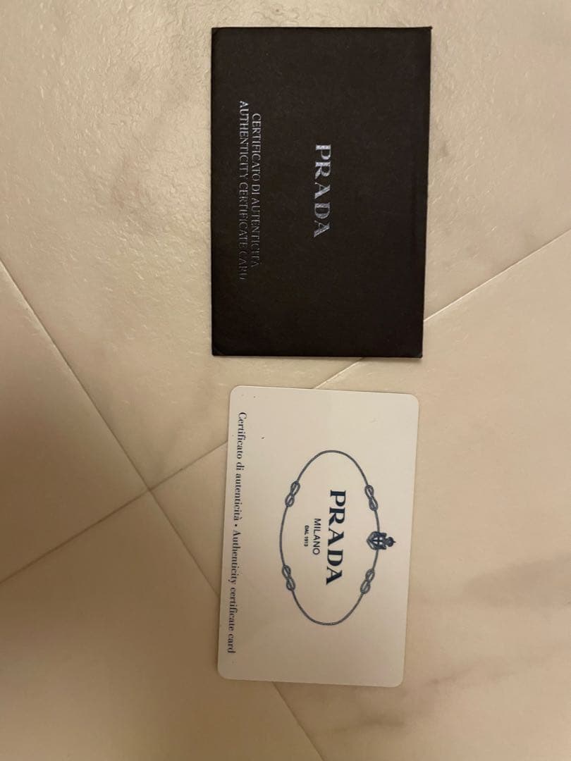 PRADA オレンジ クラッチバッグ