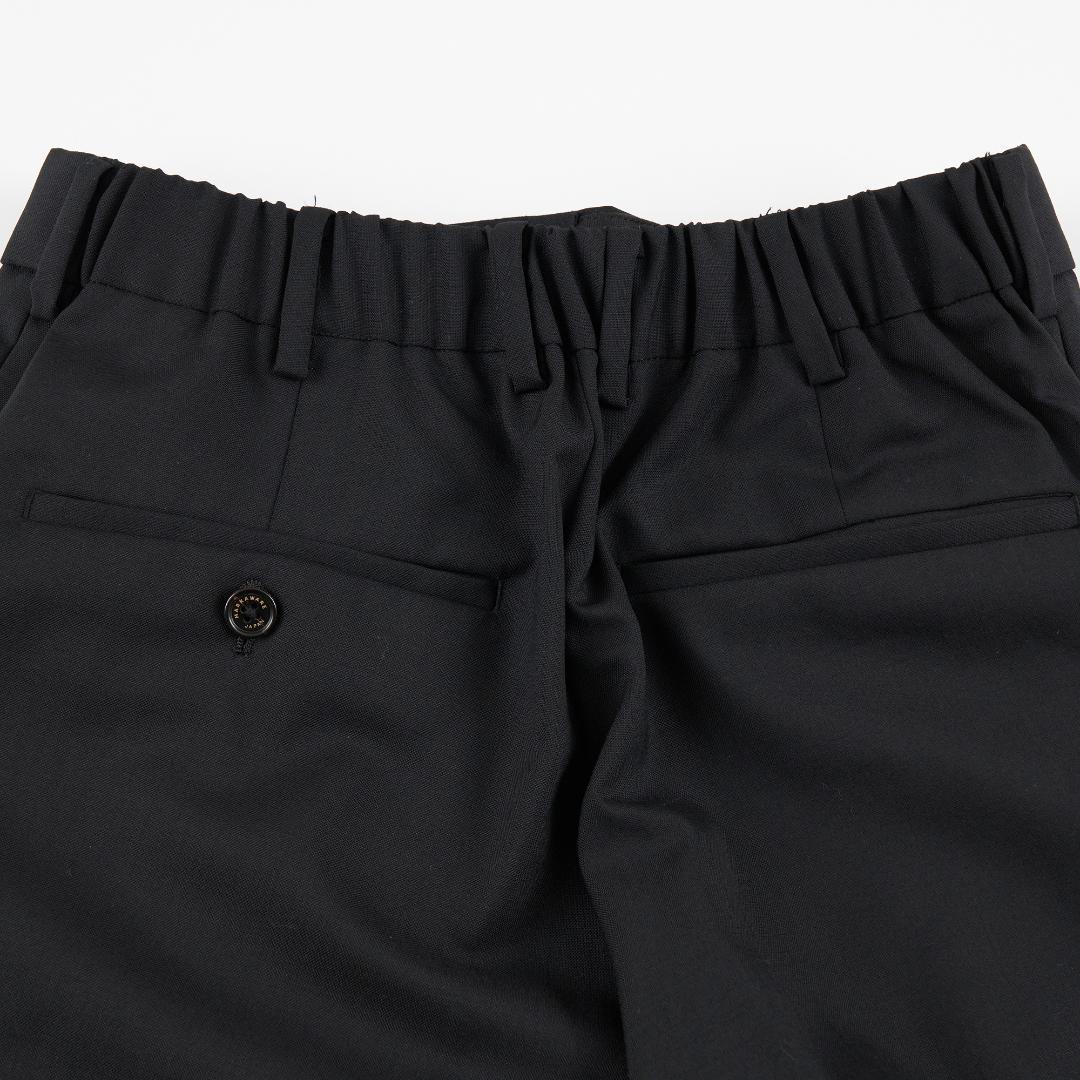 パンツ PEGTOP TROUSERS ORGANIC WOOL TROPICAL