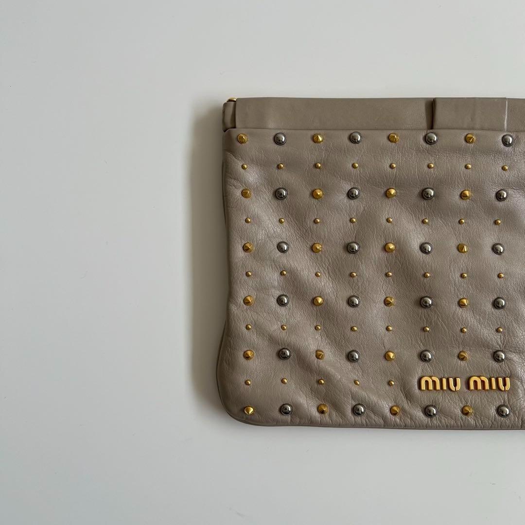 バッグ MIU MIU LEATHER STUDS FRAME CLUTCH BAG