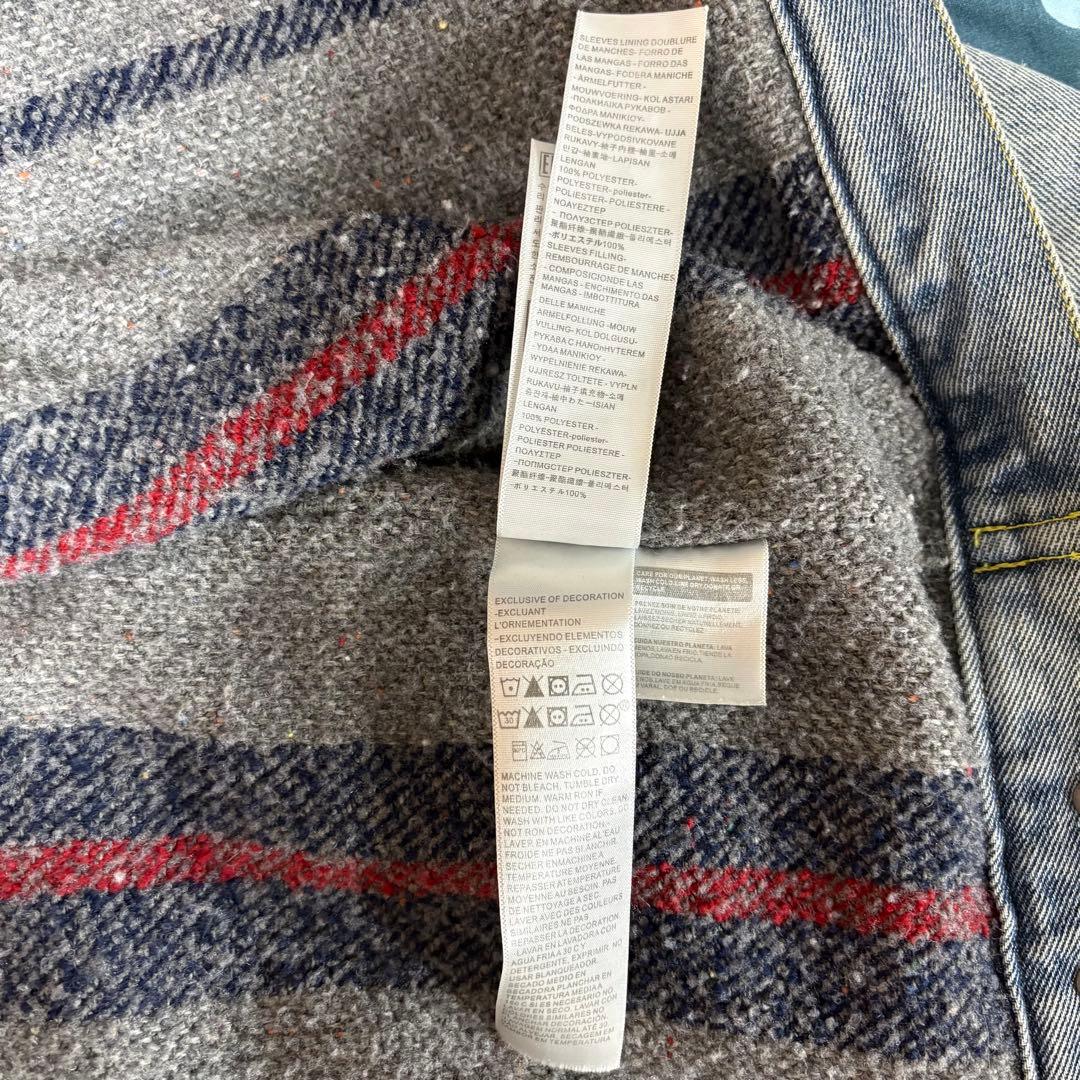 ジャケット・アウター STUSSY LEVIS EMBOSSED TRUCKER JACKET L