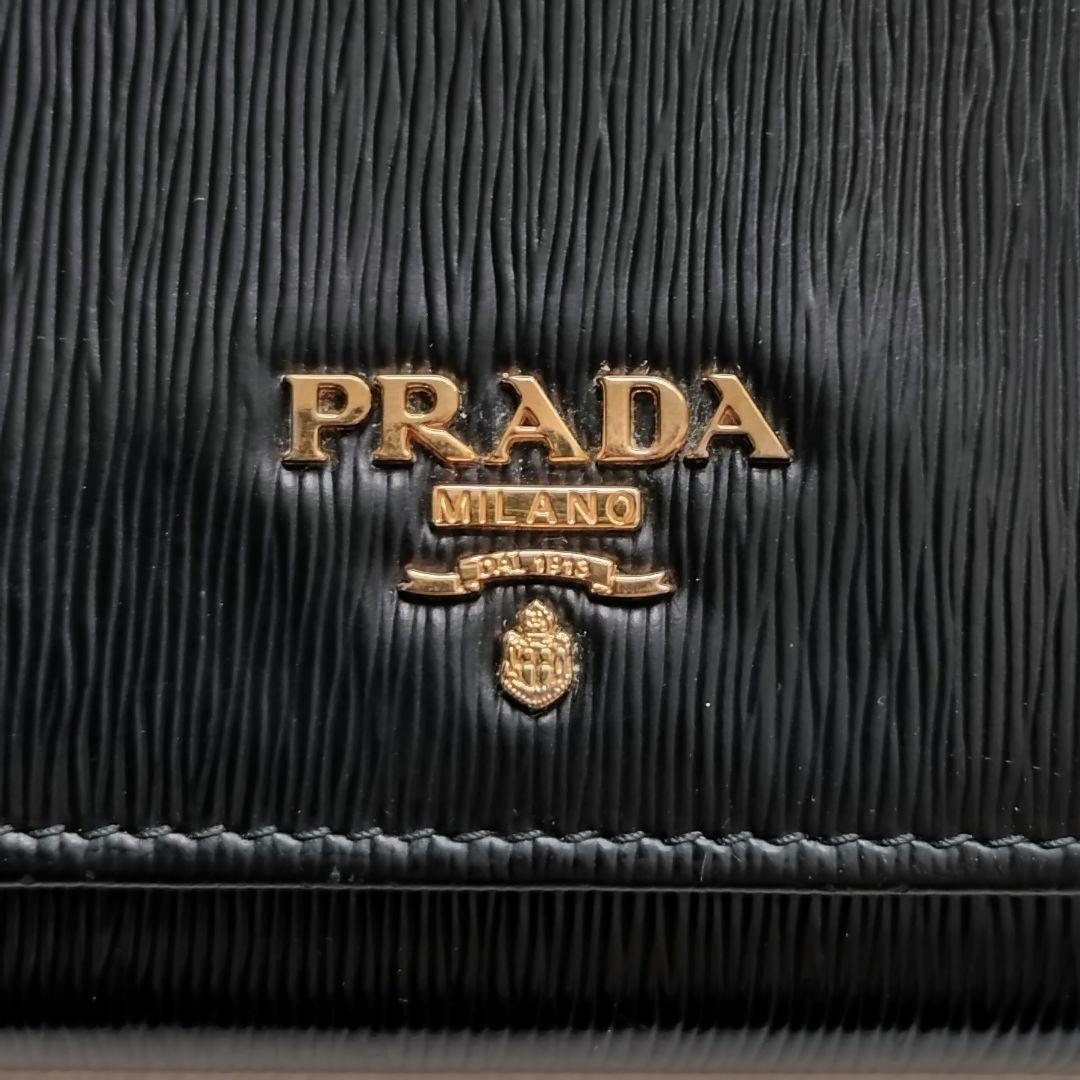PRADA 長財布 パスケース ゴールドロゴ ブラック ヴイッテロムーブ