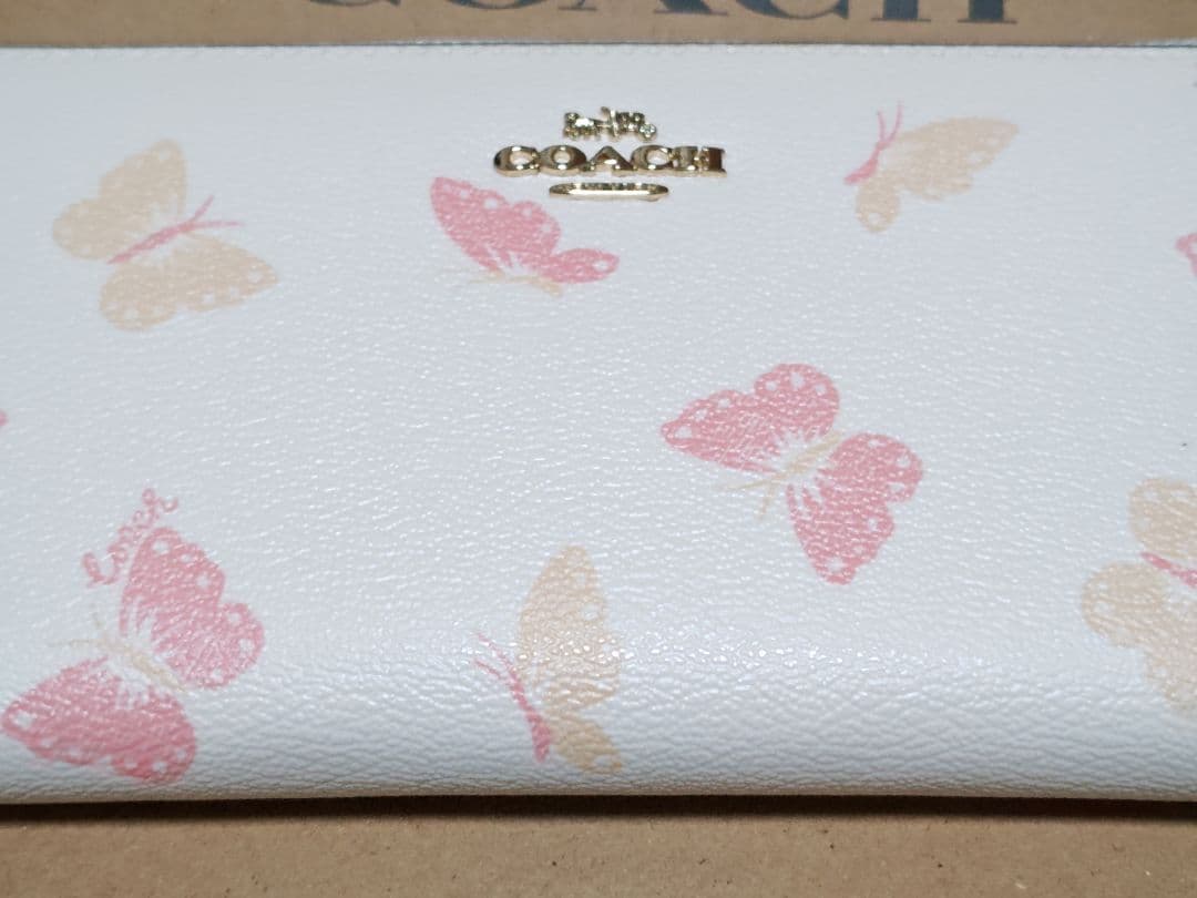COACH 正規アウトレット品 レディース長財布 ホワイト/クリーム 蝶々柄