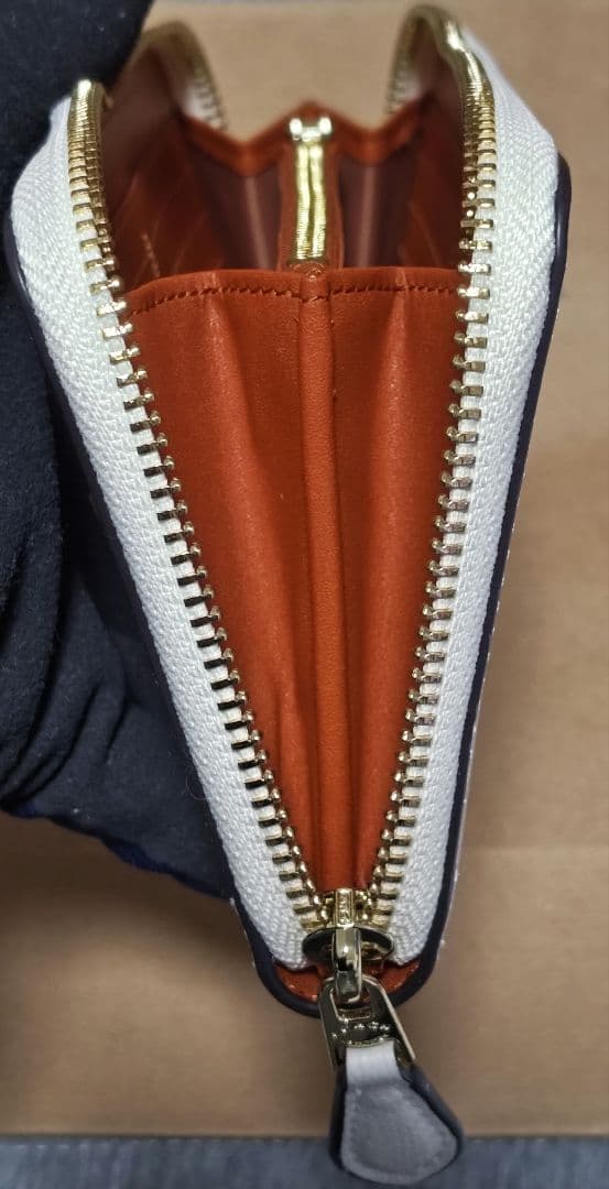 COACH 正規アウトレット品 レディース長財布 ホワイト/クリーム 蝶々柄