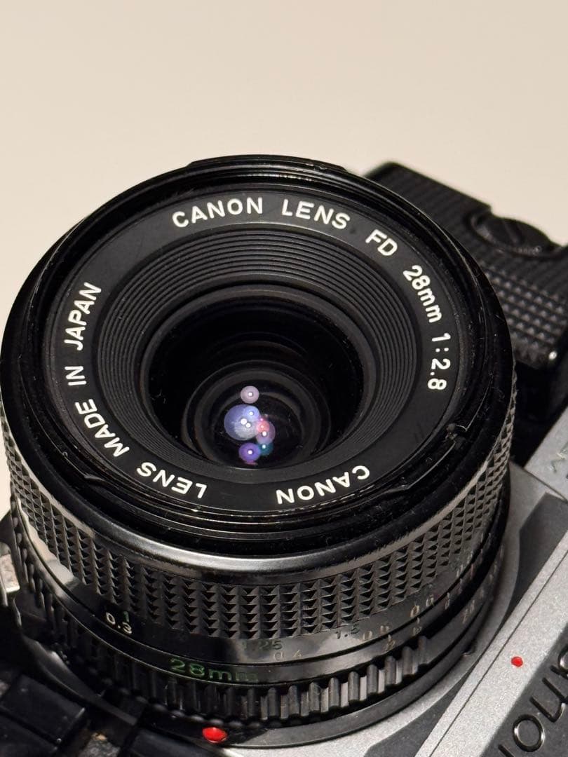 (ジャンク品)のCanon AE-1 Program 28 mmレンズ付き