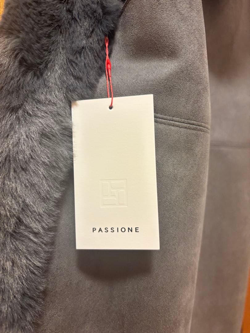 【新品未使用】PASSIONE フェークファー　フード付きベスト