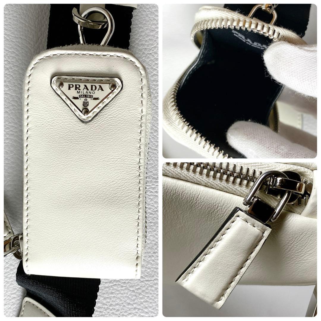 PRADA / トライアングル ショルダーバッグ エンボスロゴ ホワイト