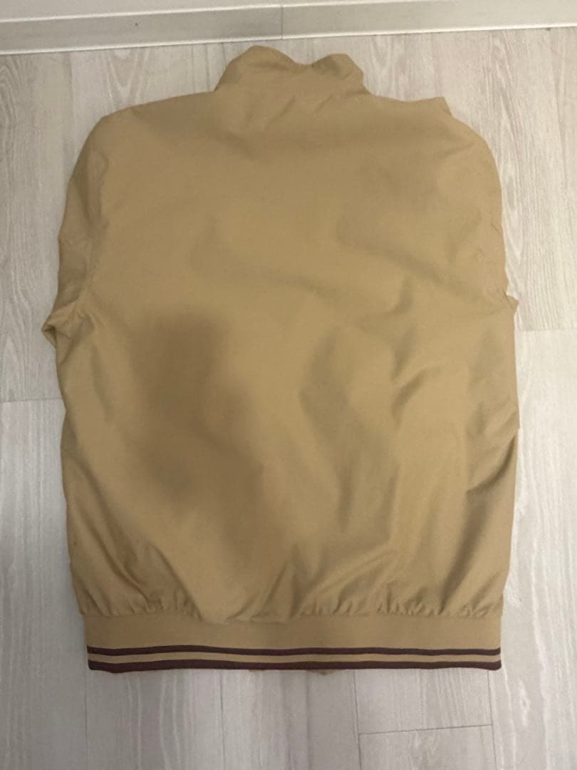 フレッドペリーの刺繍ロゴナイロントラックジャケット