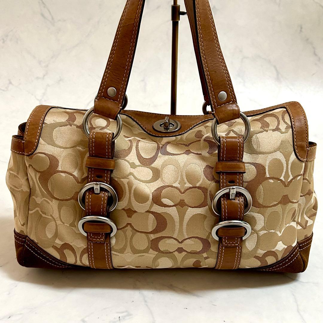 美品 コーチ ハンドバッグ シグネチャー チャーム付 レザー本革 ターンロック