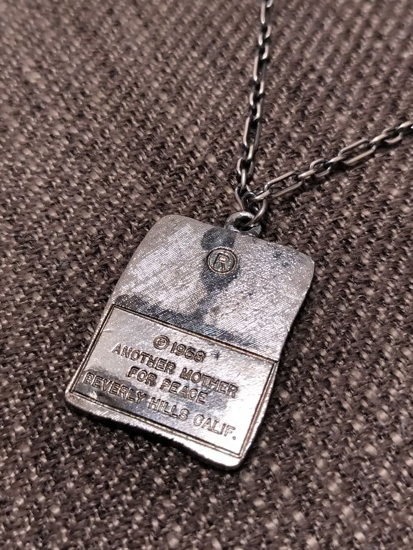 60sヴィンテージネックレスwar is not healthyローレン・シュナ