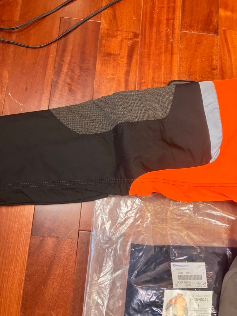 新品　Husqvarna テクニカルジャケットLサイズ オレンジ　おまけ付き