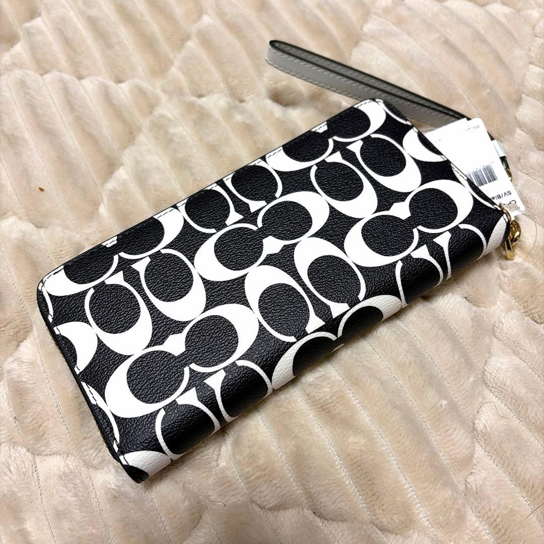 COACH ラウンドジップ 長財布 モノグラム シグネチャー 黒白