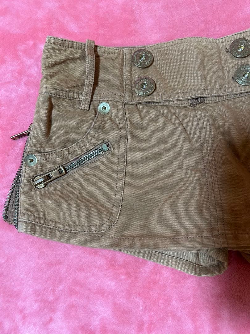 メ*グ様 d.i.a.サイドジッパー脚見せ 幅広ウエストダブルボタンマイクロミニ