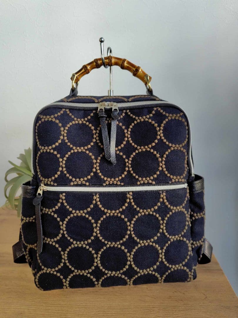 ミナペルホネン/タンバリンBK×カーキ/A4バンブーリュック本革黒