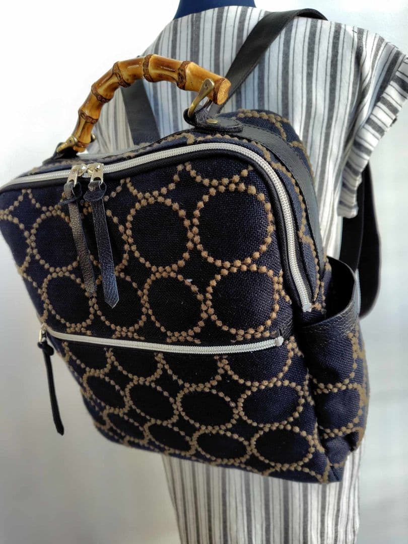 ミナペルホネン/タンバリンBK×カーキ/A4バンブーリュック本革黒