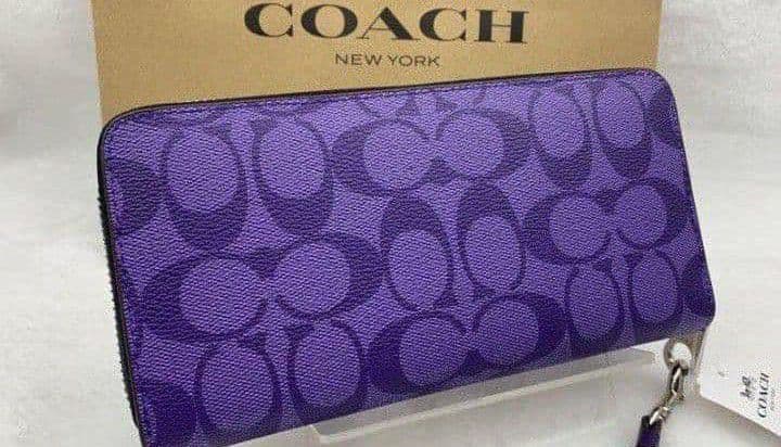 新品未使用コーチ長財布パープルシグネチャーレディースメンズ送料無料即日発送