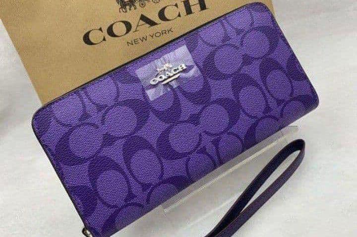 新品未使用コーチ長財布パープルシグネチャーレディースメンズ送料無料即日発送