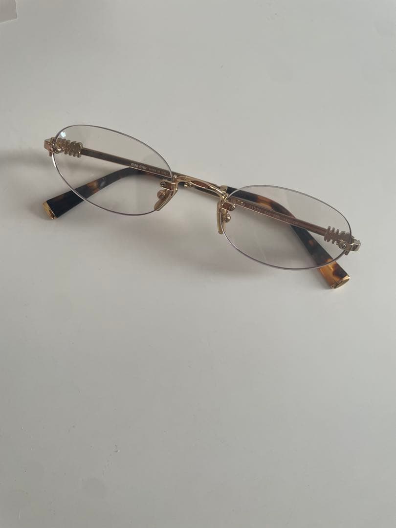 miumiu リムレスメガネ