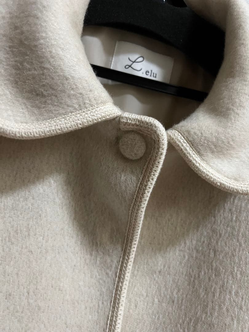 elu. エル　Ragdoll short coat / Ivory コート