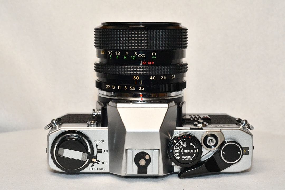 《動作品》OLYMPUS OM10+ZOOMレンズ a414