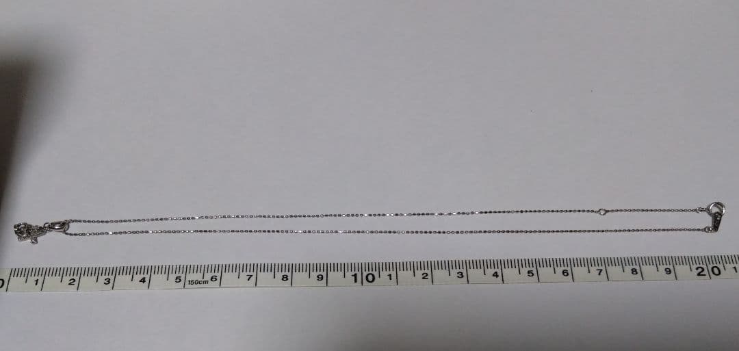 ジュエリーツツミ K10ホワイトゴールド王冠と十字架のネックレス