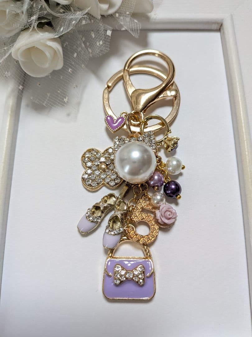 ハンドメイドチャーム　バッグチャーム　カメリア　ミニバッグ　タッセル　黒ピンク