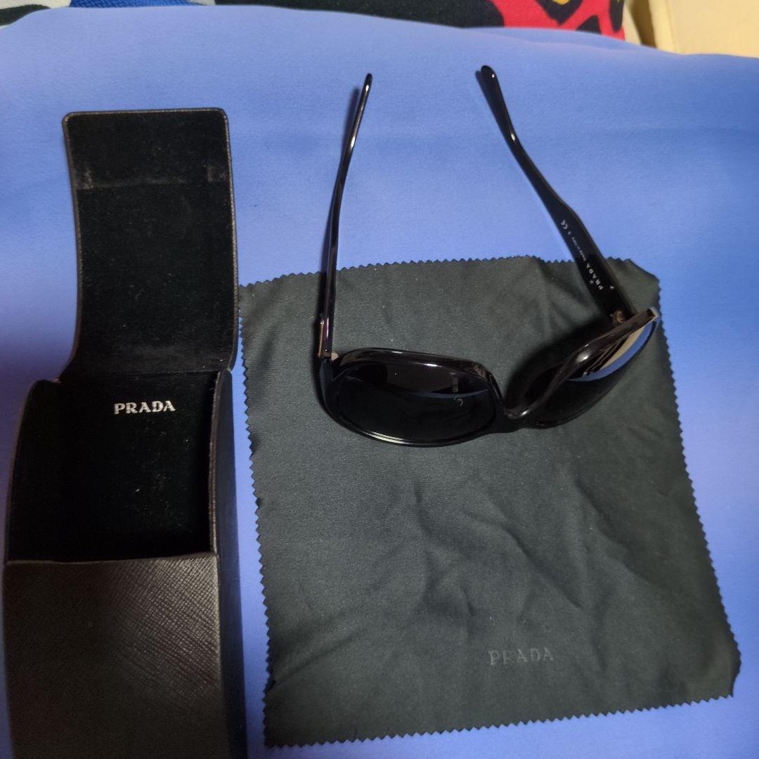 お*ぎ様 PRADA ブラックサングラス ダークブルーレンズ