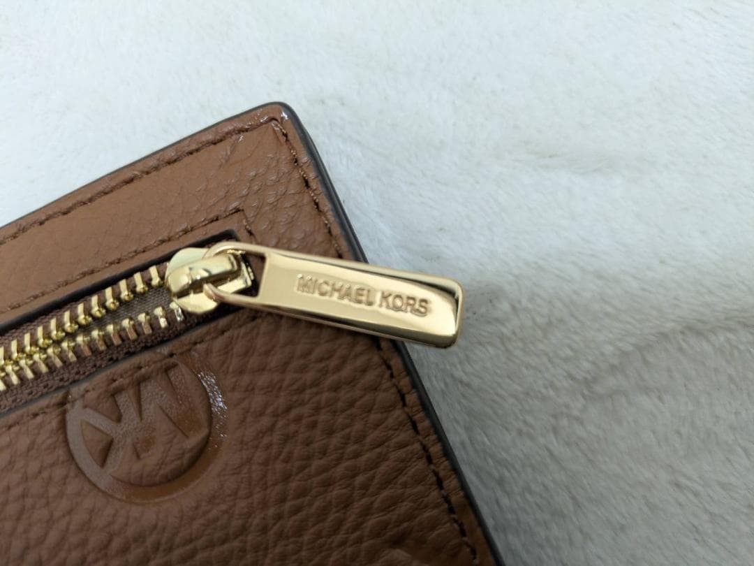 【新品未使用】マイケルコース CARSON　ロゴ デボス 長財布