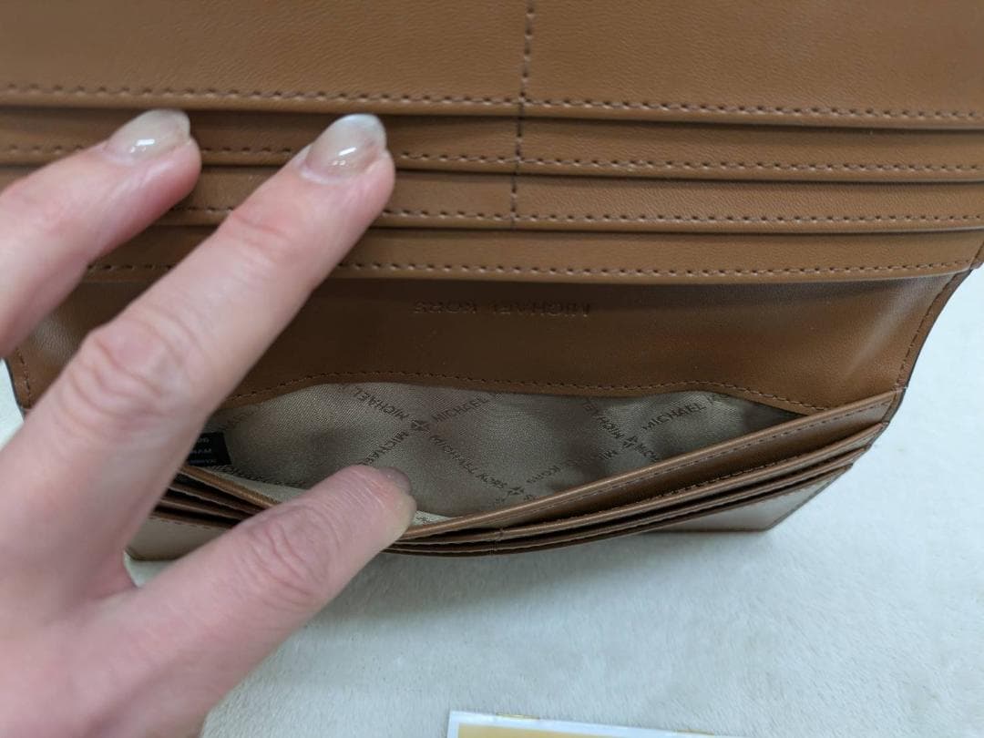 【新品未使用】マイケルコース CARSON　ロゴ デボス 長財布