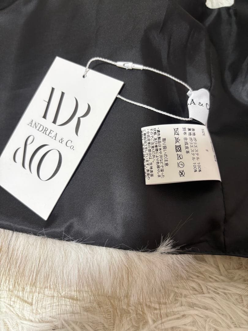 新品　タグ付き　ANDREA&Co. フェイクファーライダースベスト