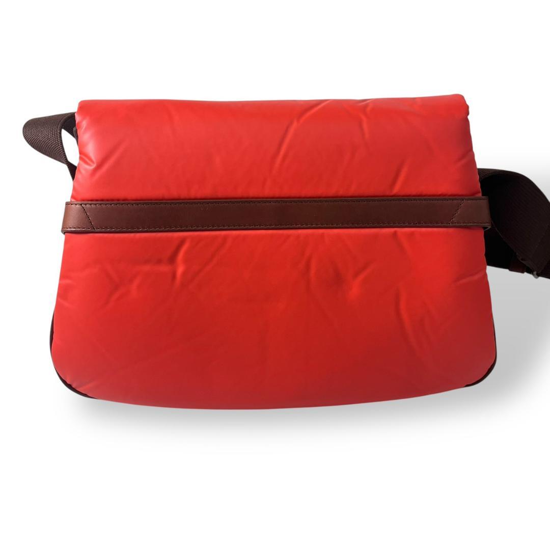 ハンティングワールド バチューサーパス キャリーオール オレンジ バッグ