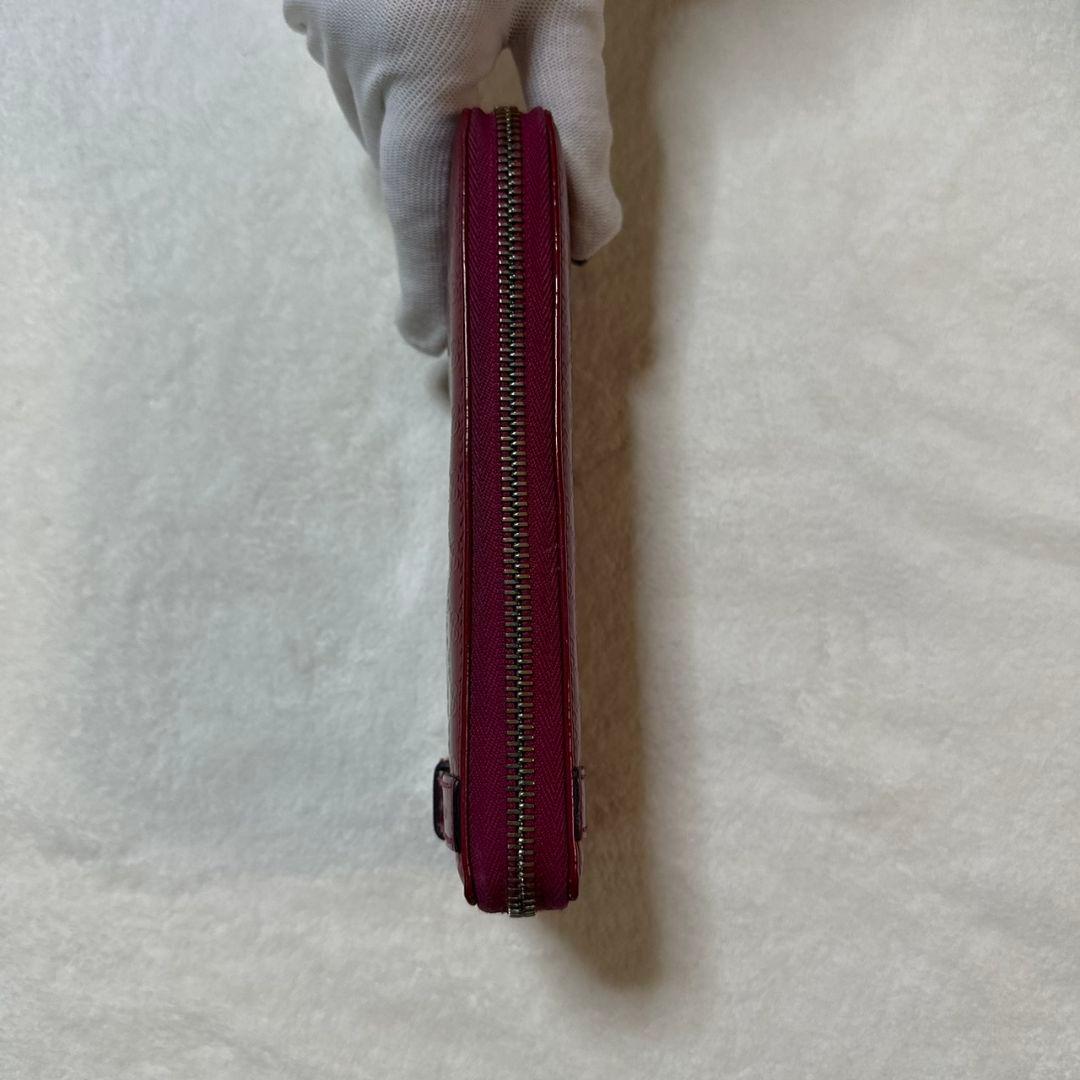GUCCI（グッチ）マイクログッチシマ エナメルラウンドファスナー長財布