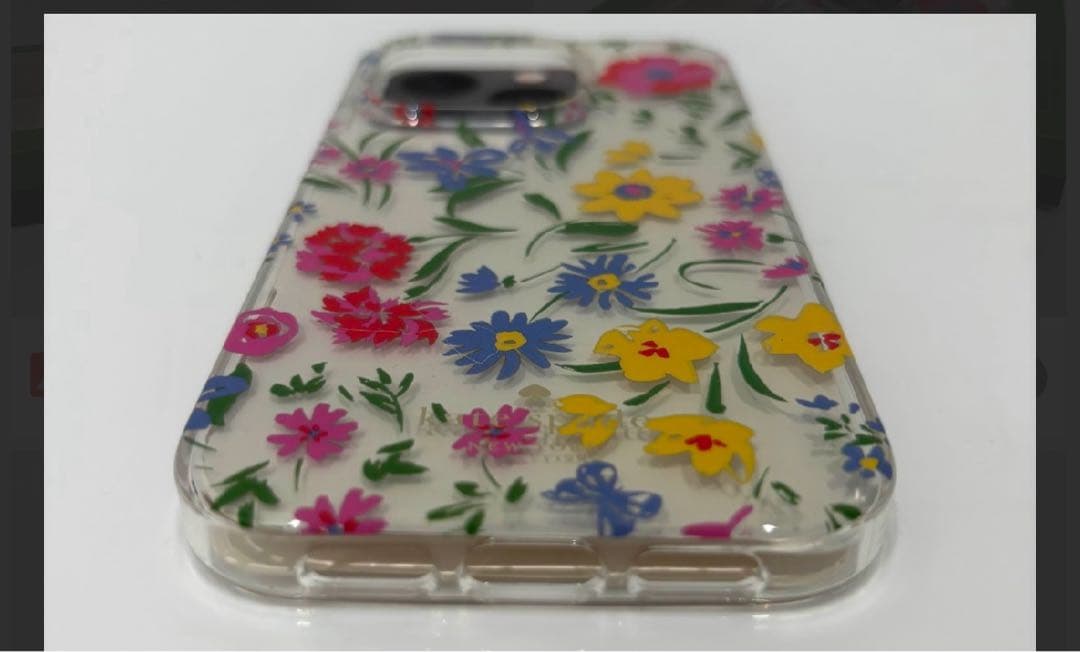 KATE SPADE iPhone14Proスマホリング付属 クリームマルチ1