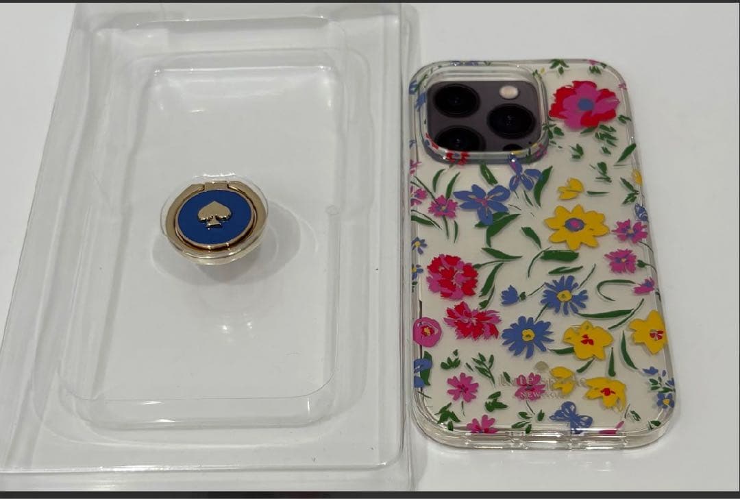 KATE SPADE iPhone14Proスマホリング付属 クリームマルチ1