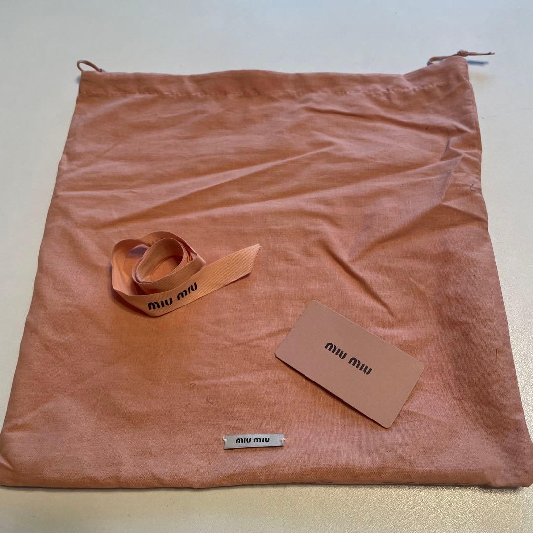 miu miu スタッズ付きクラッチバッグ