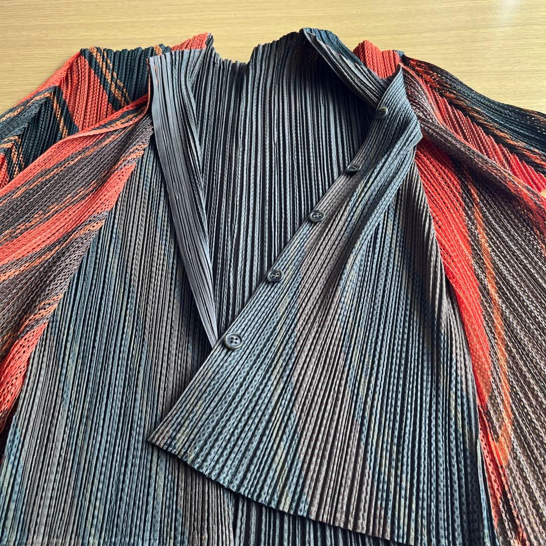 Mz　プリーツプリーズのオレンジ色とモスグリーンの上着