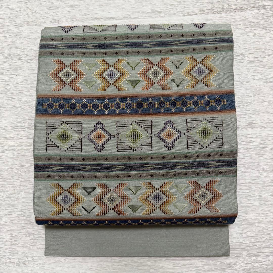 m-52 沖縄県指定無形文化財 読谷山花織 本場琉球 名古屋帯 正絹 極美品