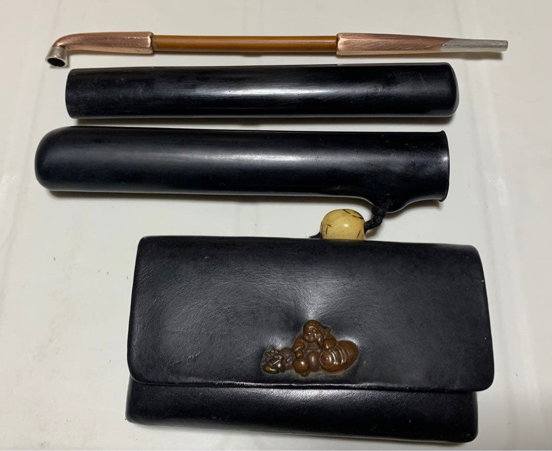 携帯用のキセル（煙管）ケースと煙草入れ　ダイコクさんの柄入