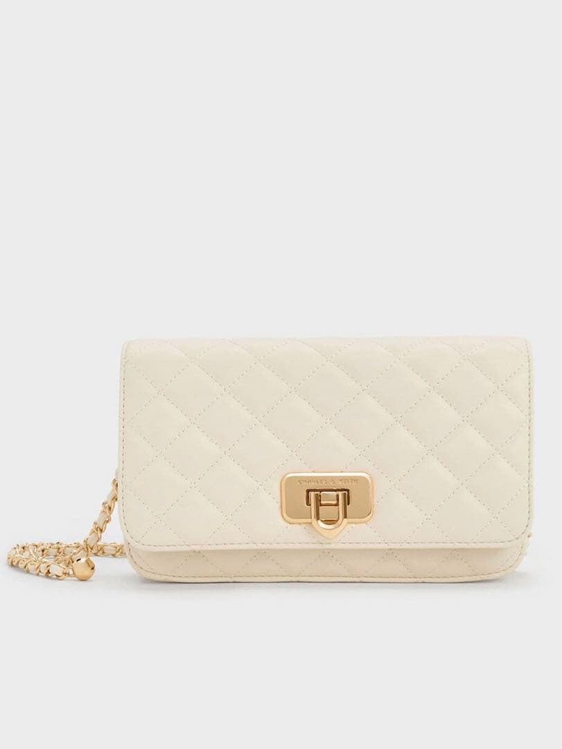 Cressida クレシダ キルトプッシュロッククラッチ - クリーム