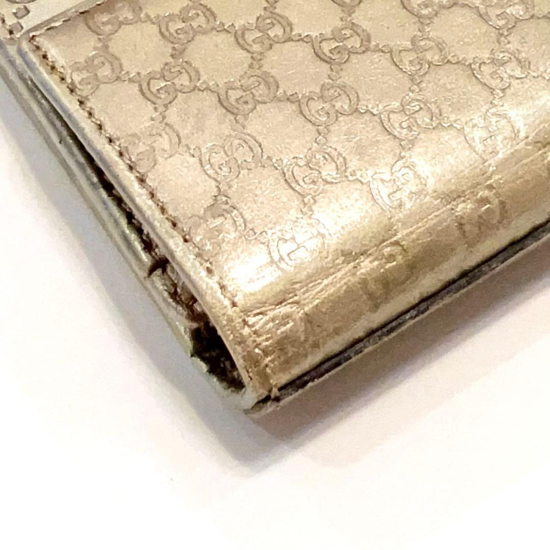 グッチ 長財布 シマ マイクロGG インターロッキング レザー 大容量 ゴールド