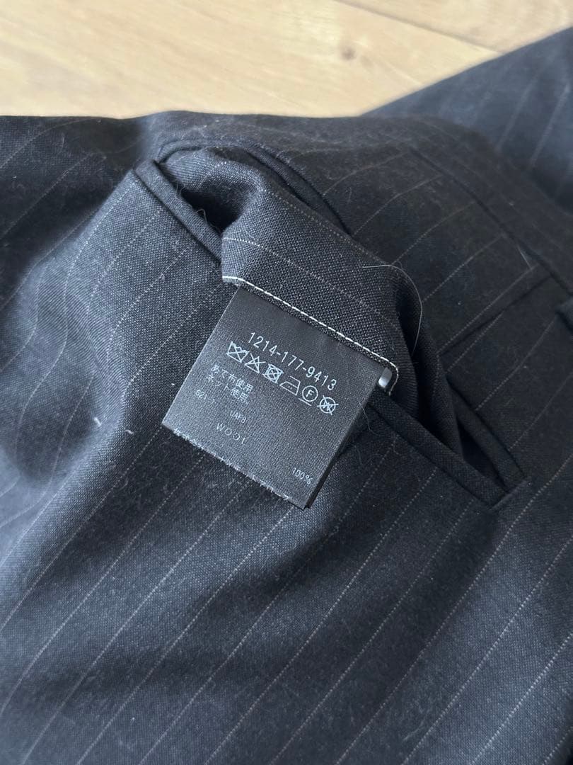 H エイチ ウールトロピカル 2プリーツワイドパンツ